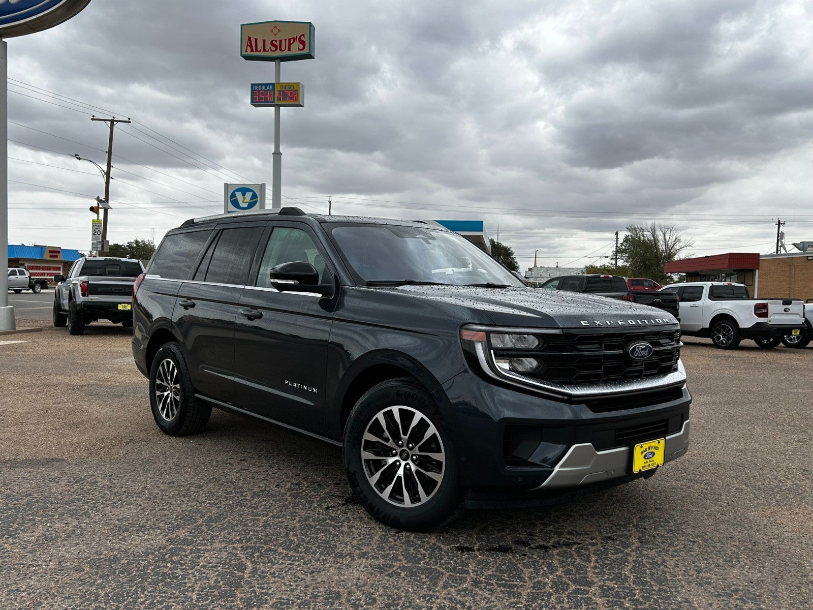 2025 Ford Expedition Platinum in Stone Blue Metallic — front three-quarter view