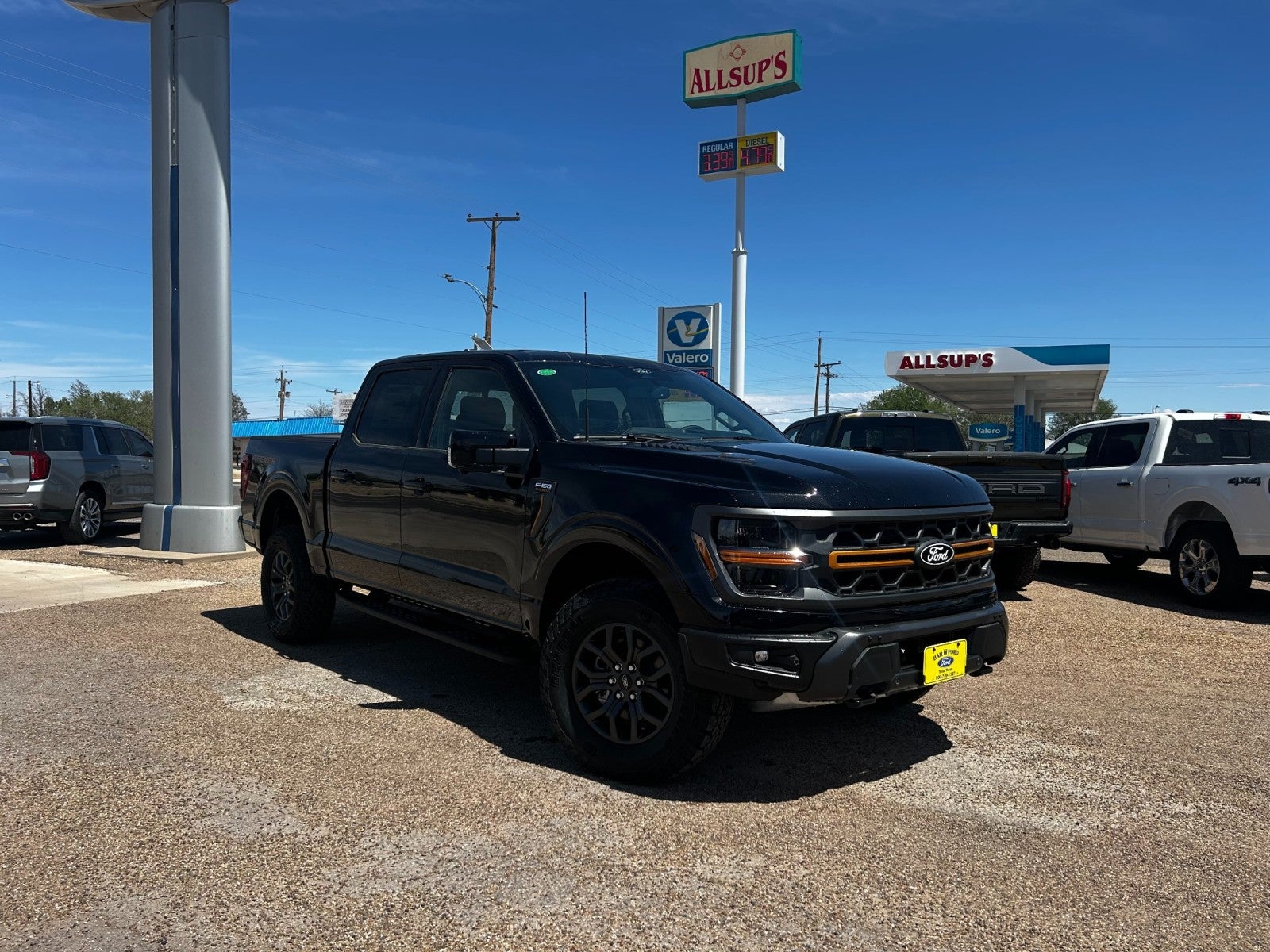 2025 Ford F-150 Tremor in Agate Black Metallic — front three-quarter view